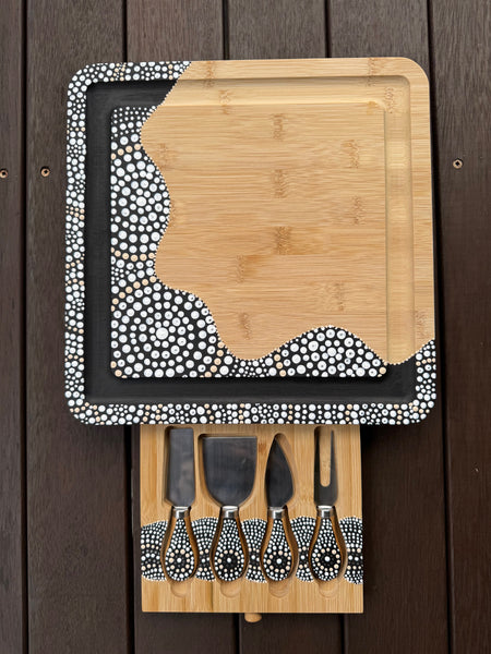 Cheese board and knives